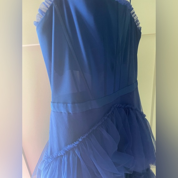 It is made of a mesh material, it is see through on the stomach only, blue dress - Picture 7 of 10